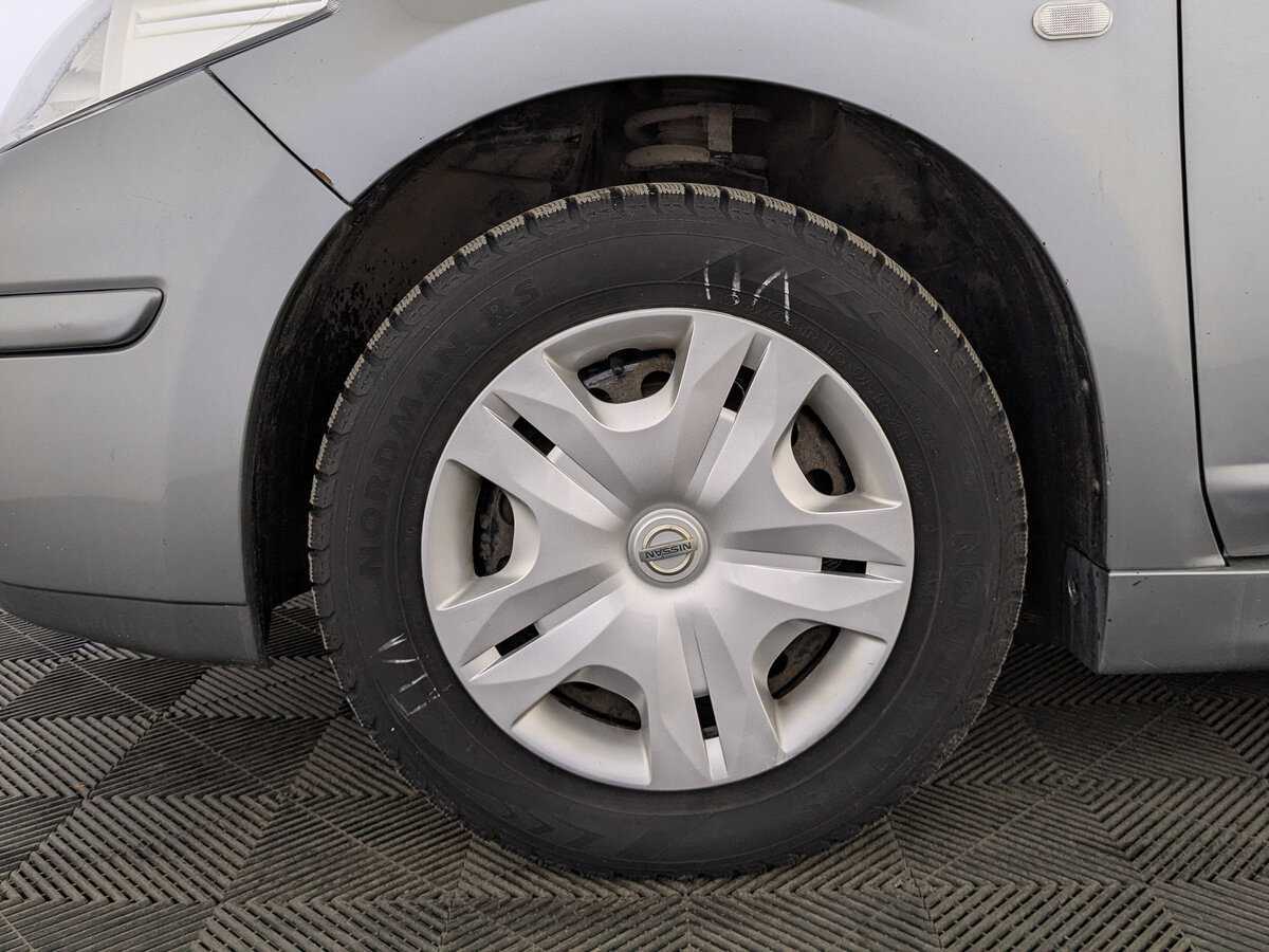 Nissan Tiida, 2013 Фото №12