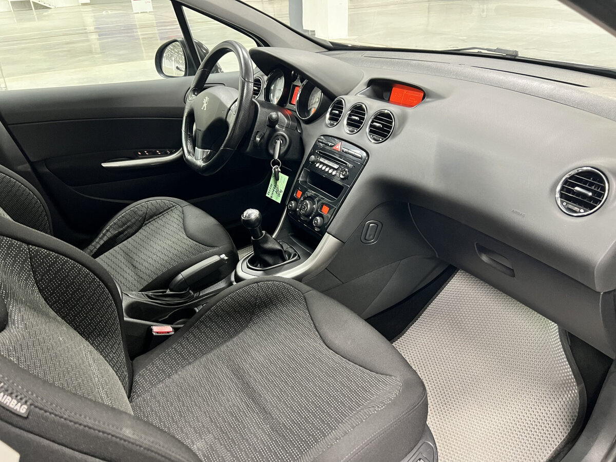 Peugeot 308 I Рестайлинг, 2012 Фото №11